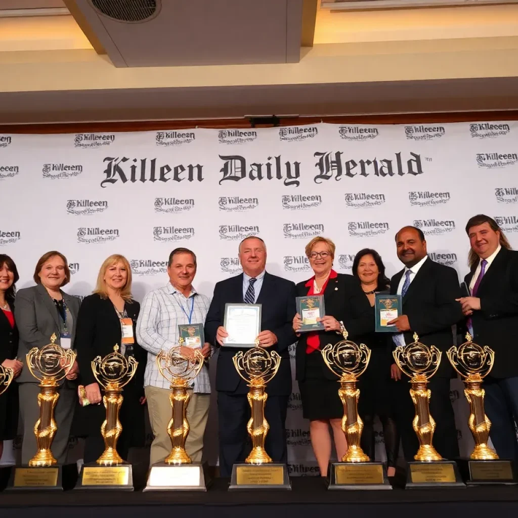 Killeen Daily Herald Award winners celebrating at the Texas Press Association ceremony.
