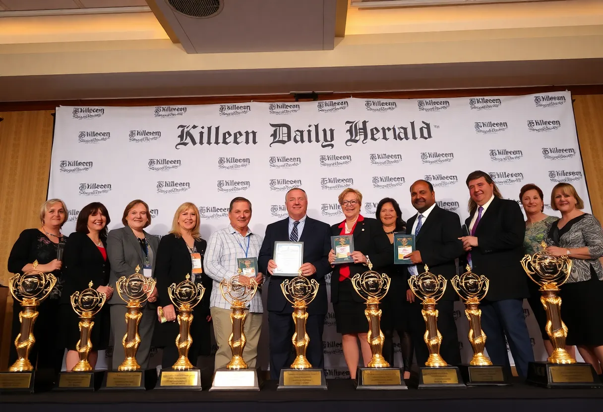 Killeen Daily Herald Award winners celebrating at the Texas Press Association ceremony.